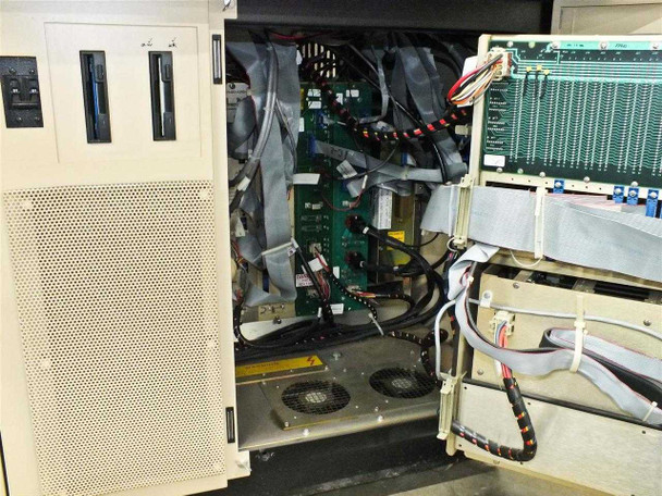 K&S 1484 internal electronics cabinet open showing control boards, card cage, ribbon cables, and cooling fans