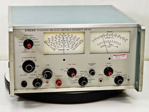 Singer Stoddart NM-37/57 EMI Field Intensity Meter – front panel view showing dual analog meters, band selector, attenuator, tune and fine tune knobs, and function controls