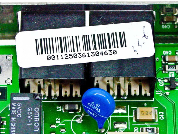 US Robotics Winmodem 00112503 — close-up of barcode label on RJ-11 port housing showing full barcode number 0011250361304630
