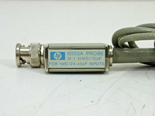 HP 10013A probe housing label showing 10:1 10 MOhm/13pF for 1MOhm/24-45pF inputs