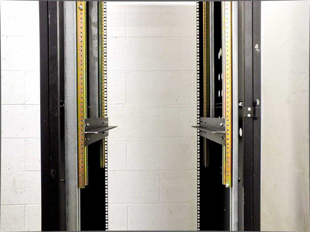 Close-up of 37U rackmount cabinet interior showing dual vertical EIA rail pairs with gold zinc-plated rails and adjustable mounting brackets