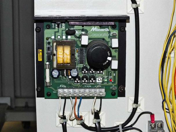 Minarik Corporation DC motor speed controller board mounted inside BF-200 cabinet – green PCB with speed control potentiometer and terminal block wiring