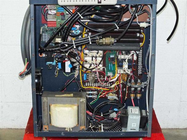 Hitran AT0098-01 transformer interior — right side panel removed showing main transformer core, control PCB, wiring harness, terminal blocks, and internal components