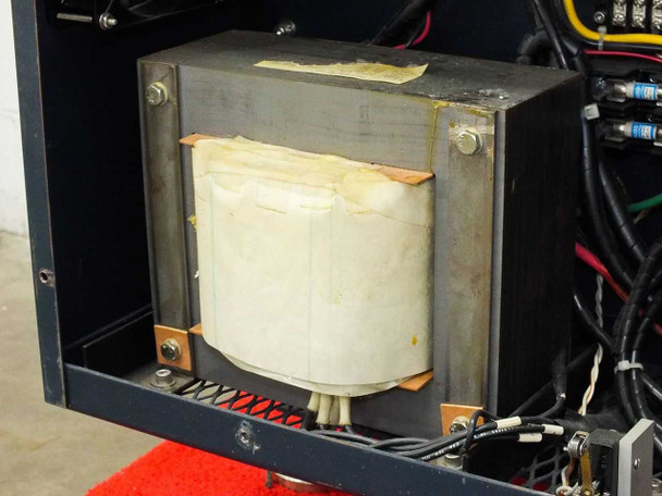 Hitran AT0098-01 interior — main toroidal/core-type welding transformer visible with white insulation wrap and copper foil windings