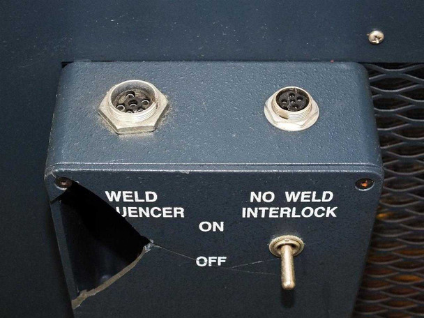 Hitran AT0098-01 — close-up of Weld Sequencer circular connector and No Weld Interlock toggle switch on side panel
