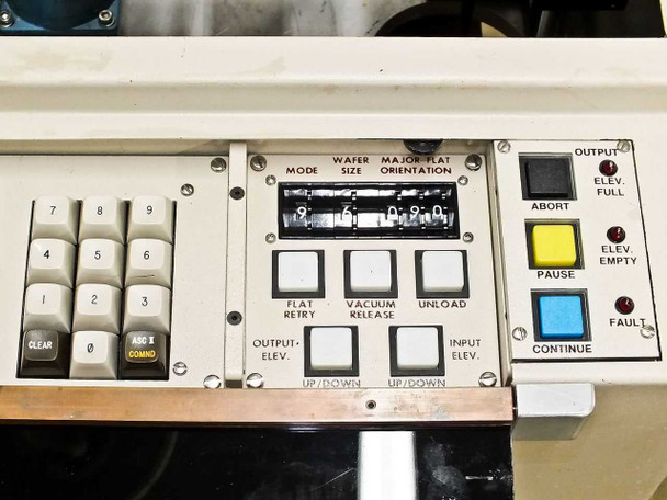 P5NMS secondary control panel showing numeric keypad, wafer size/major flat/orientation selector dial, flat retry, vacuum release, unload buttons, and abort/pause/continue/fault indicators