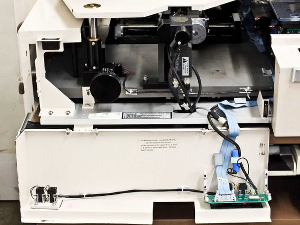 P5NMS interior view showing wafer transport arm assembly with ribbon cable, stepper motor, and position sensor in open access panel