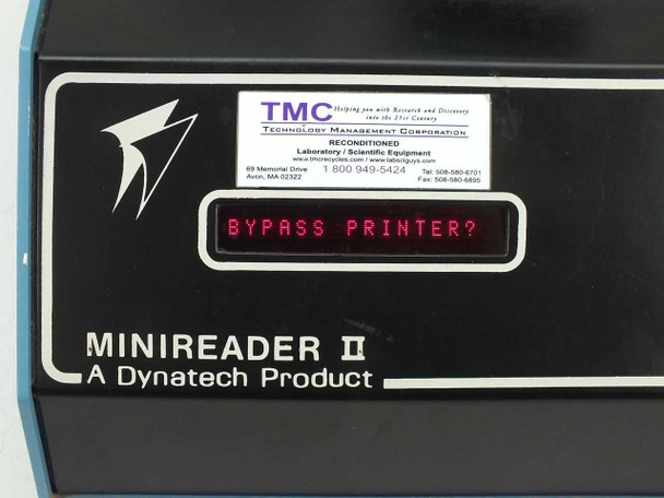 Close-up of Dynatech Minireader II front panel LED display showing BYPASS PRINTER message and TMC reconditioned label