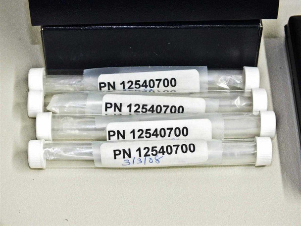 Four P/N 12540700 injector tubes in sealed packaging with date label 3/3/08