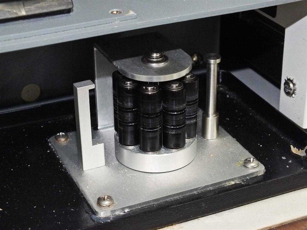 Close-up of peristaltic pump roller head assembly on IRIS Advantage spectrometer