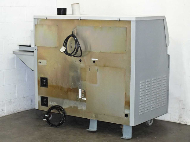 Rear panel of IRIS Advantage main cabinet showing discoloration, staining and power cable