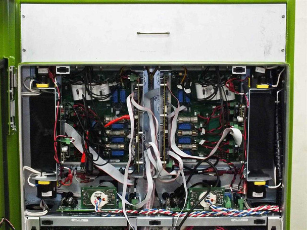 GreenVolts GV-SCP001 – upper internal view showing multiple inverter PCBs, ribbon cables, and blue capacitor banks