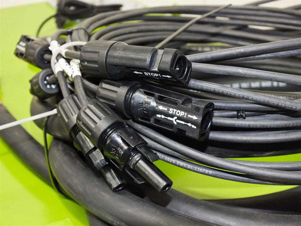 GreenVolts GV-SCP001 – coiled MC4 solar input cable set showing multiple MC4 connectors with STOP labels
