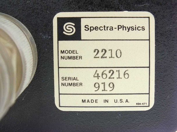 Spectra-Physics 2210 model label closeup — showing Model Number 2210, Serial Number 46216 919, Made in USA