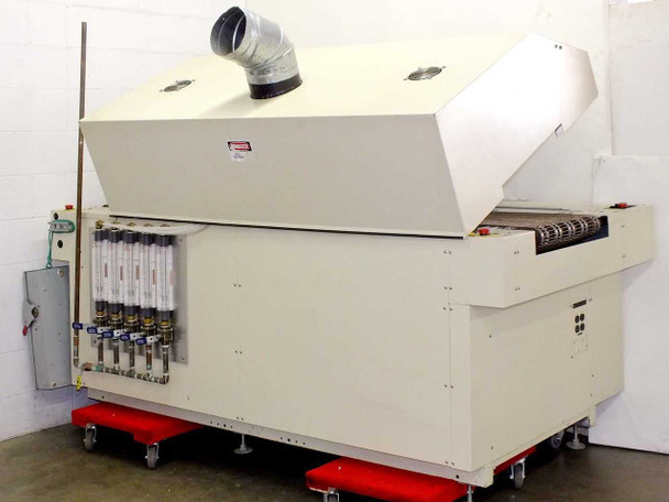 Vitronics ISO5006 left-side view with exhaust duct connected to top and nitrogen flow meter bank visible on side panel