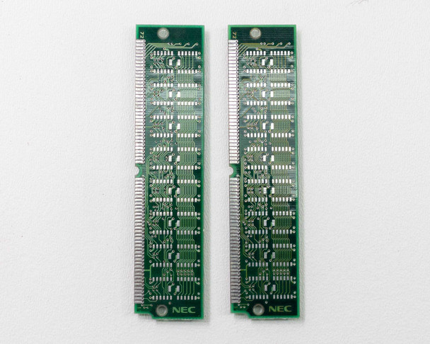 Compaq 185174-002 NEC EDO SIMM pair — reverse side (solder side) of both modules showing NEC branding printed on PCB