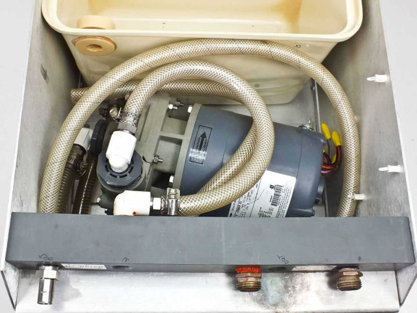 Interior top-down view showing Magnetek Century AC motor, pump assembly, and braided stainless hose routing