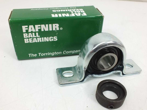 Fafnir RPB 3/4 pillow block bearing beside original Fafnir Ball Bearings box and rubber seal collar – angled view