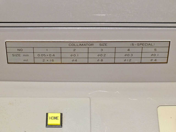 Seiko SFT7000 collimator size reference label — 5 positions ranging from 0.05x0.4mm to 0.1mm, with HOME button below