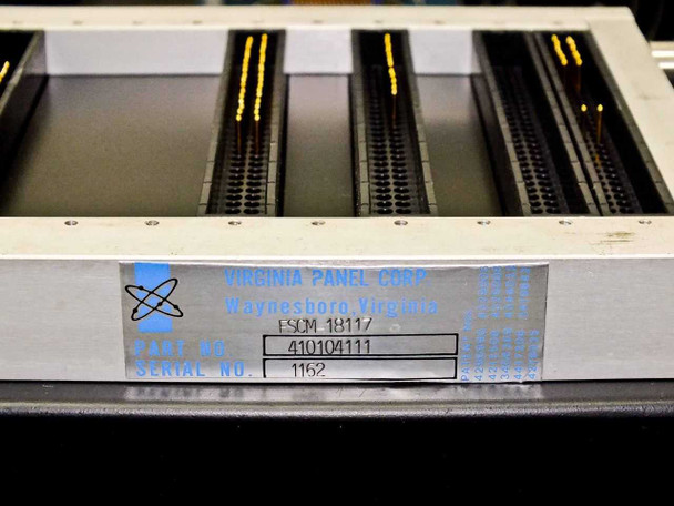 Virginia Panel Corp HNVS Test Fixture Assembly label close-up — label reads 'Virginia Panel Corp, Waynesboro Virginia', FSCM 18117, Part No. 410104111, Serial No. 1162