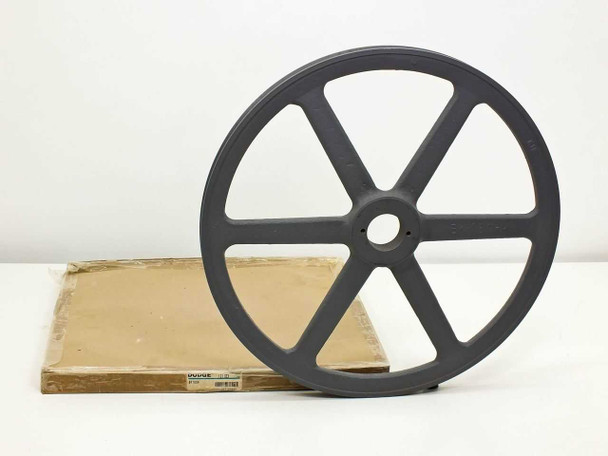 Dodge BK160H 121103 1-groove split taper sheave resting on original cardboard box — front face view showing 6-spoke cast iron wheel