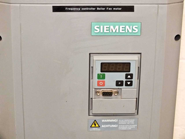 Siemens Midimaster Eco front panel close-up showing 4-digit LED display, start/stop buttons, DB9 serial port, and boiler fan motor label