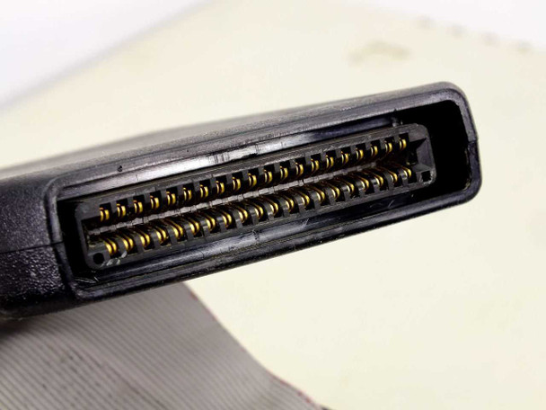 Close-up of 40-pin gold-contact DIP emulation clip connector on the III514B emulation harness