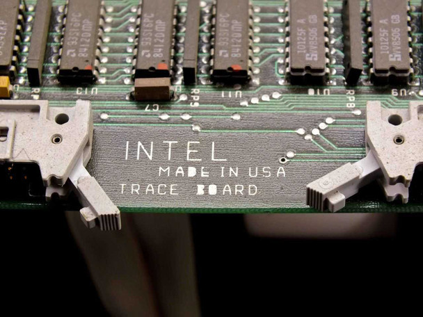 Intel Trace Board PCB close-up with silkscreen reading INTEL MADE IN USA TRACE BOARD and edge connector teeth visible