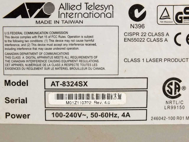 Allied Telesyn AT-8324SX bottom label showing model number, serial number, power rating 100-240V 50-60Hz 4A, and regulatory markings