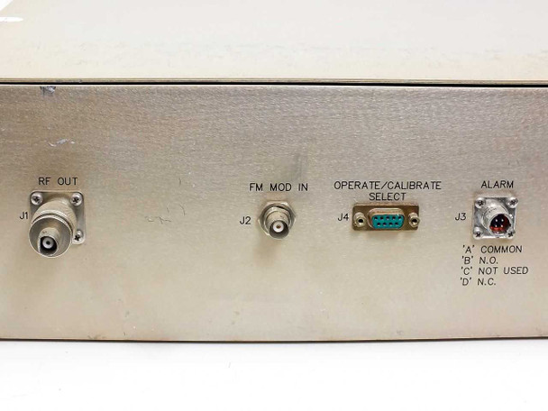 3dbm 70FMO-BS-2X-AYD rear panel close-up – J1 RF Out BNC, J2 FM Mod In BNC, J4 DB9 connector, J3 alarm terminals labeled Common, N.O., Not Used, N.C.