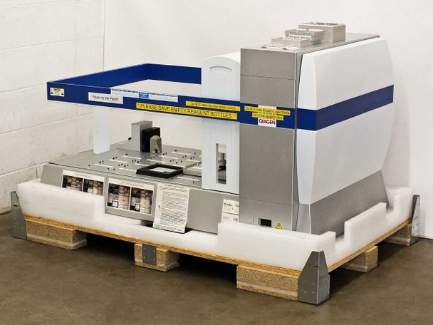 Qiagen BioRobot 8000 automated liquid handling workstation on original custom pallet with foam packaging, front cover absent, blue overhead arm visible