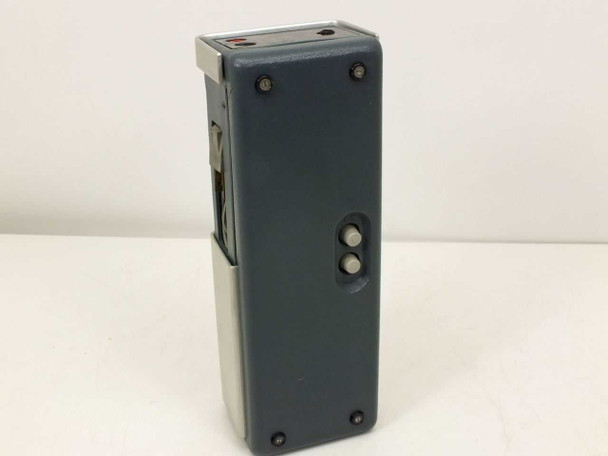 Optimum Electronics PG404 Pattern Generator – right side view showing smooth gray housing and two port openings