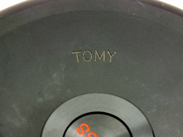 Tomy TMS-4 rotor close-up of TOMY brand name embossed into the black rotor body