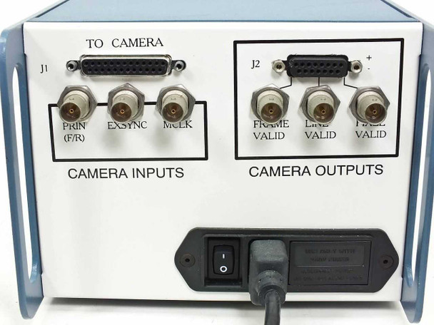 Uniforce PSIF-2 rear panel close-up showing J1 Camera Inputs (PRN F/R, EXSYNC, MCLK BNC connectors) and J2 Camera Outputs (FRAME VALID, LINE VALID BNC connectors) with D-sub connectors and rocker power switch