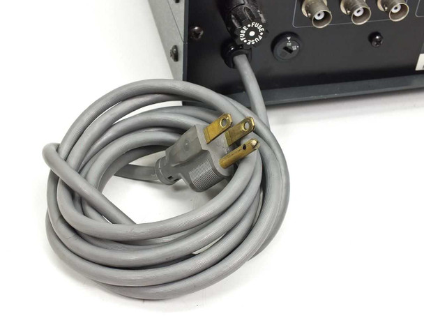 Burleigh RC-46 — close-up of included gray 3-prong AC power cord with fuse holder visible at rear panel connection point