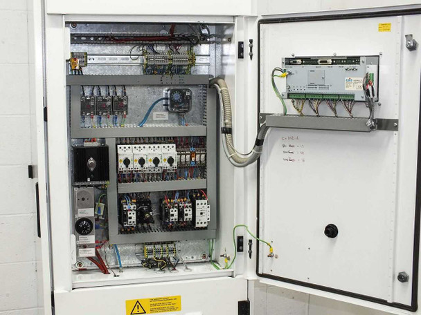 Lanco LTX08 main electrical cabinet open — terminal blocks, Moeller motor starters, contactors, relay blocks, wiring harness, and sub-panel mounted on door