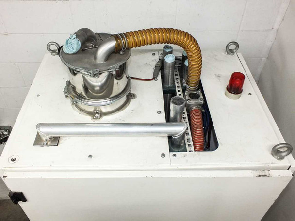 Lanco LTX08 top deck — stainless steel hopper/loader with clamped lid, gold corrugated flex hose, red warning indicator lamp, and additional port screens