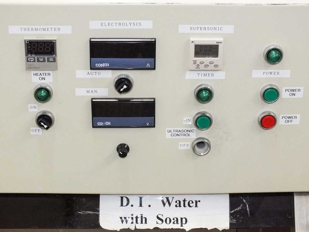 Right-zone control panel detail showing thermometer, electrolysis, supersonic controls, Conch panel meters, ultrasonic on/off, and 'D.I. Water with Soap' label