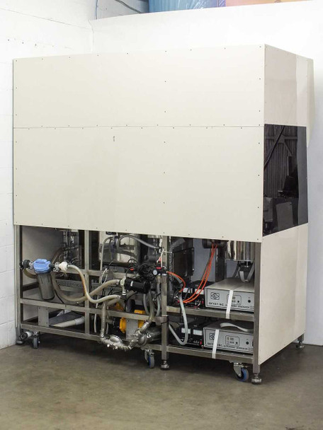 Rear view of complete bench showing back panel, plumbing manifold, hoses, yellow pump, Skyey ultrasonic generator units, and additional control boxes