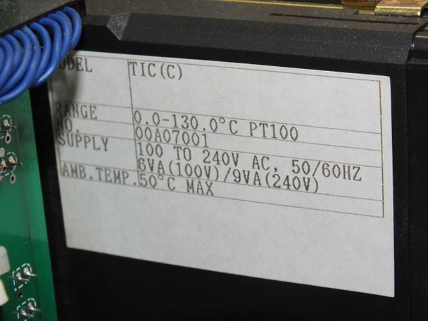Close-up label on Kubota TIC(C) temperature controller showing range 0.0–130.0°C PT100, model 00A07001, supply 100–240V AC 50/60Hz