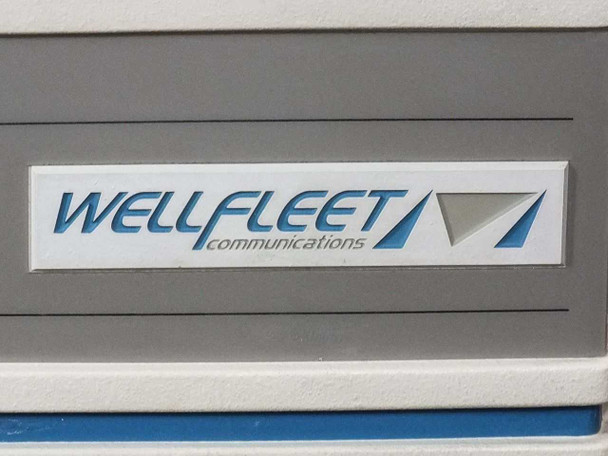 Wellfleet Communications logo close-up on front panel – blue and white Wellfleet Communications branding