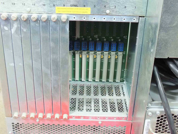 Wellfleet 75040 BCN rear card cage showing numbered slots 1–14 with SRML label; several cards populated with blue connectors