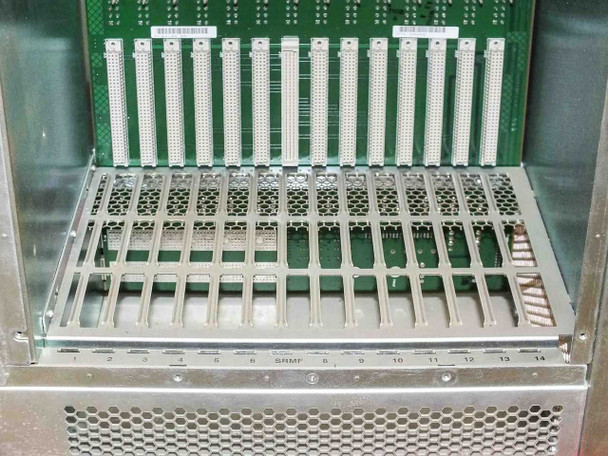 Wellfleet 75040 BCN backplane close-up – 14 card slots numbered 1–14 with SNMP slot labeled, green backplane board