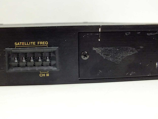Standard MT650 front panel right section showing SATELLITE FREQ DIP switch channel selector and access panel with cosmetic wear