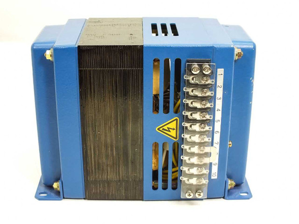 Matsunaga CV-145-200 — right side view showing laminated core stack, high-voltage warning label, and numbered 10-position terminal block