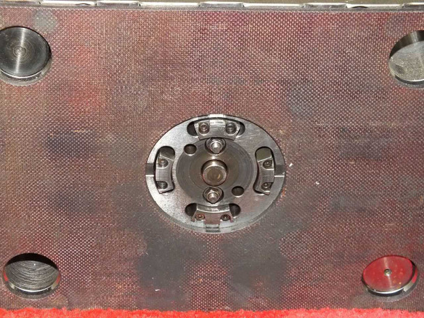 Meike MDMI injection mold – close-up of circular gate/sprue bushing and cavity detail on mold face