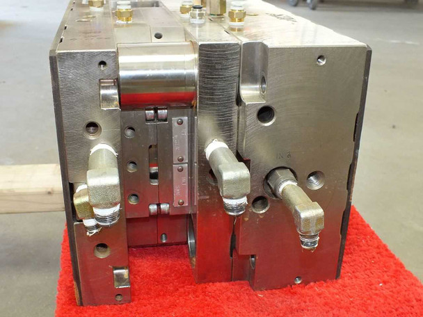 Meike MDMI injection mold – opposite end view showing mold halves, parting line, and pneumatic quick-connect fittings