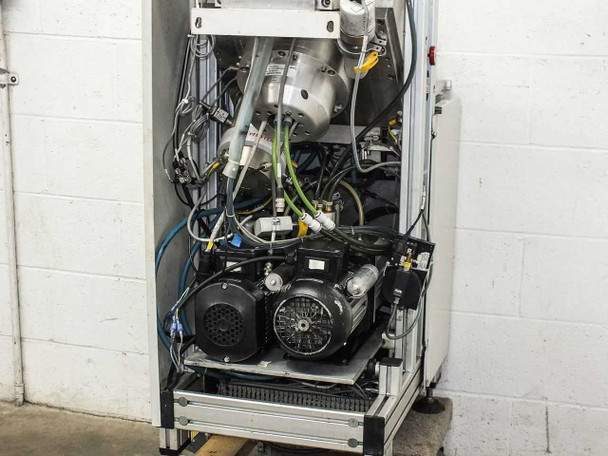 Balzers BPS Swivel 98 1.5 Metalizer – rear interior view showing both Leybold roughing pump motors on lower shelf and vacuum plumbing above