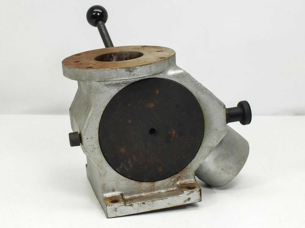 Left side of three-way gate valve showing circular disc face, mounting base, and hand lever