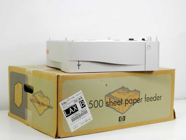 HP C8055A 500-Sheet Paper Feeder sitting atop its original HP yellow cardboard box, LAX warehouse label visible on box front